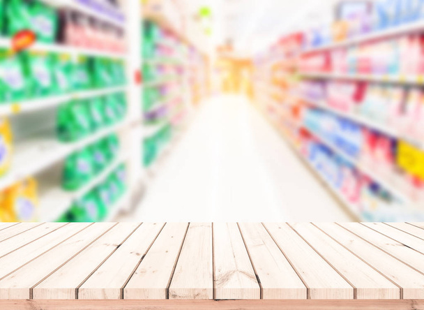 wooden planks with abstract blurred background of supermarket - Photo, Image