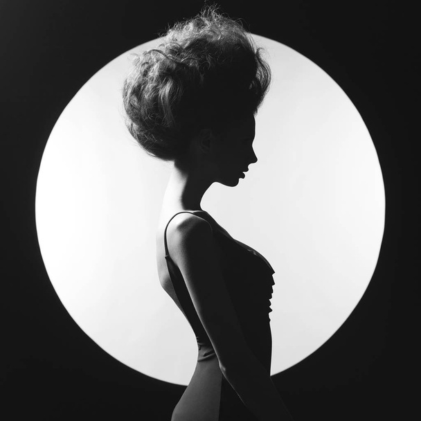 Elegant woman on geometric background - Photo, Image