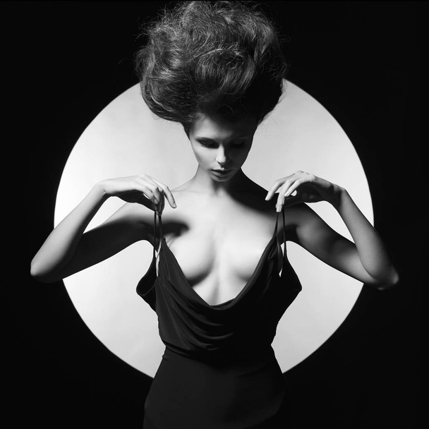 Elegant sensual woman on geometric background - Foto, Imagen