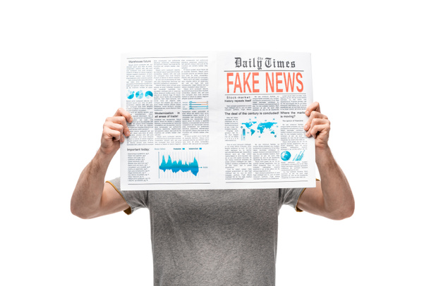 man in grey t-shirt holding newspaper with fake news isolated on white - Fotoğraf, Görsel
