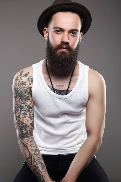 Brutal hipster boy with tattoo - Photo, Image