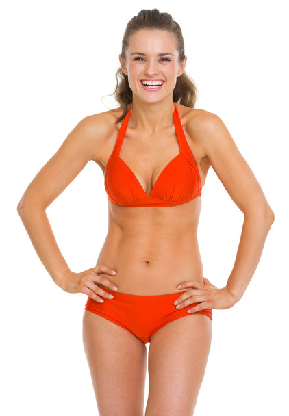 Portrait of smiling young woman in swimsuit - Zdjęcie, obraz