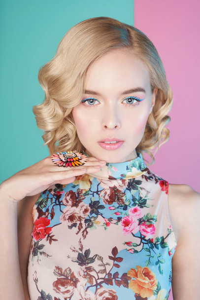 Blonde woman with color makup on colorful background - Fotografie, Obrázek