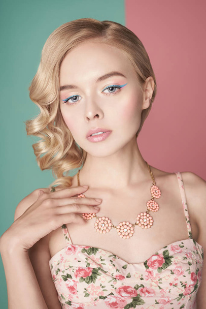 Blonde woman with color makup on colorful background - Fotografie, Obrázek