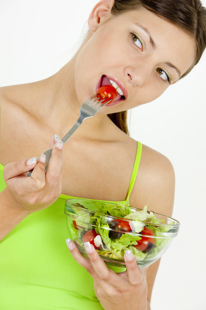 Woman eating salad - Foto, immagini