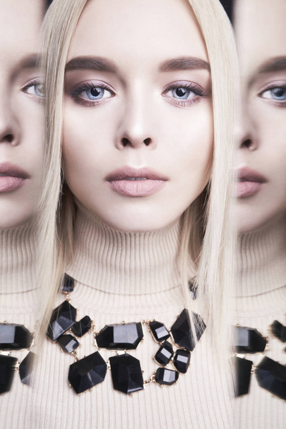Beautiful young blonde with classic makeup and modern jewelry - Zdjęcie, obraz