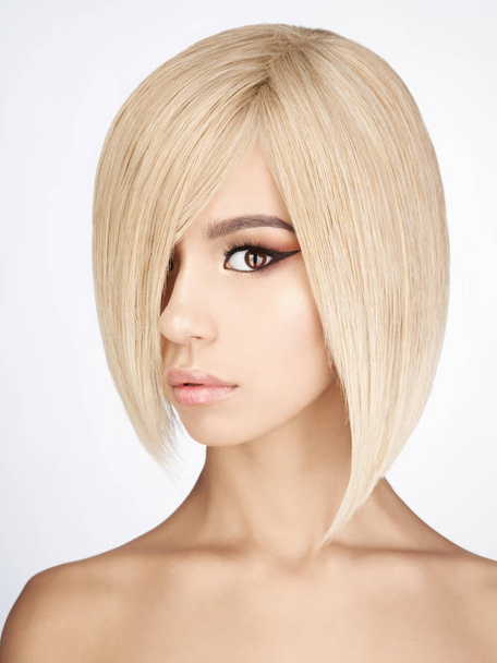 Lovely asian woman with blonde short hair  - Zdjęcie, obraz