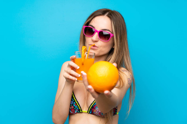 Young woman in bikini in summer holidays - Фото, изображение