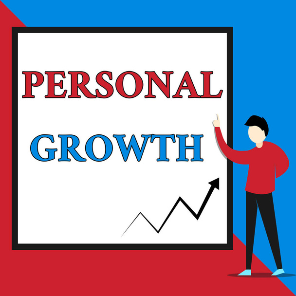 Text sign showing Personal Growth. Conceptual photo improve develop your skills qualities Learn new materials View young man standing pointing up blank rectangle Geometric background. - Photo, Image
