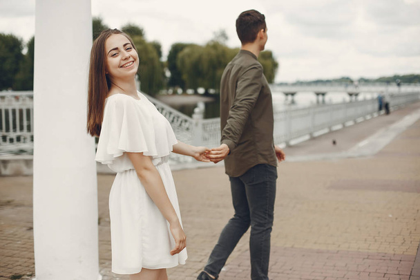 Beautiful couple spend time in a summer city - Photo, Image