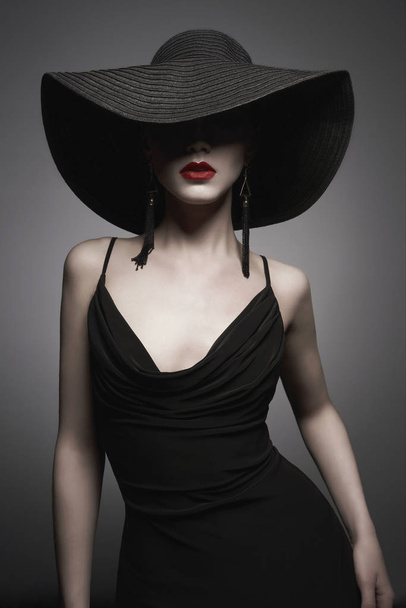 portrait of young lady with black hat and evening dress - Photo, Image