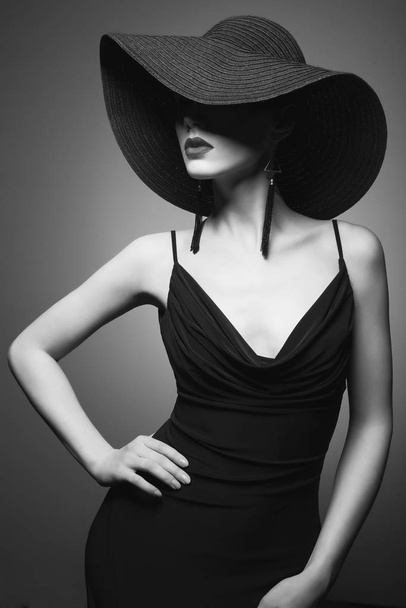 portrait of young lady with black hat and evening dress - Fotoğraf, Görsel