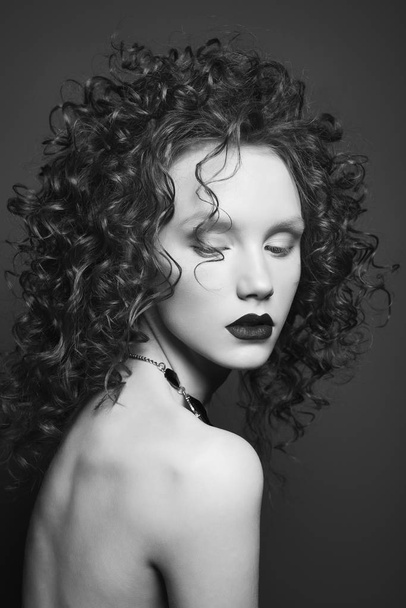 Beautiful nude woman with curly-hair and black lips. - Φωτογραφία, εικόνα