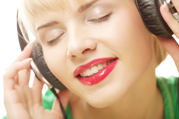 Beautiful woman listen to the music - Foto, Imagem