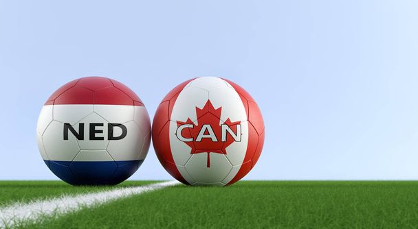 Netherlands vs. Canada Soccer Match - Soccer balls in Netherland and Canada national colors on a soccer field. Copy space on the right side - 3D Rendering  - Фото, изображение