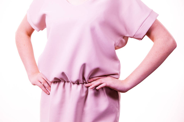 Female wearing casual pink tunic dress - Фото, изображение