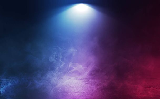 Empty background scene. Dark reflection of the street on the wet asphalt. Rays of neon light in the dark, clouds of smoke, fog. Night view of the street. Abstract dark background. - Photo, Image