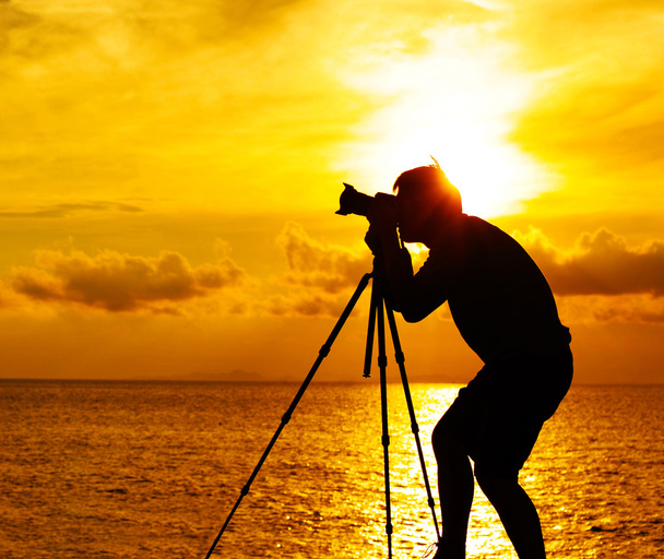 Photographe silhouette au coucher du soleil
 - Photo, image