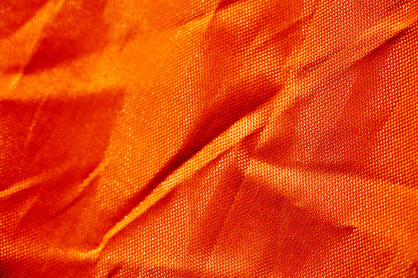 Oranje polyester macro abstracte achtergrond beeldende kunst in hoge kwaliteit prints producten - Foto, afbeelding