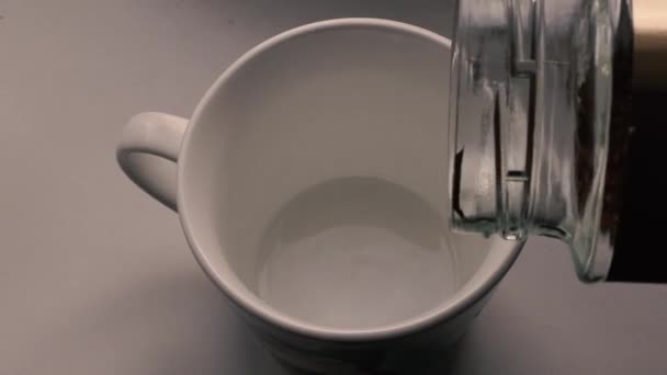 brew sublimated instant coffee in a cup - Materiał filmowy, wideo