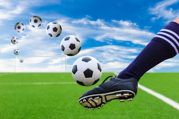 foot kicking soccer ball - Фото, изображение