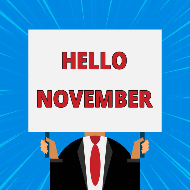 Handwriting text writing Hello November. Concept meaning Welcome the eleventh month of the year Month before December Just man chest dressed dark suit tie no face holding blank big rectangle. - Photo, Image