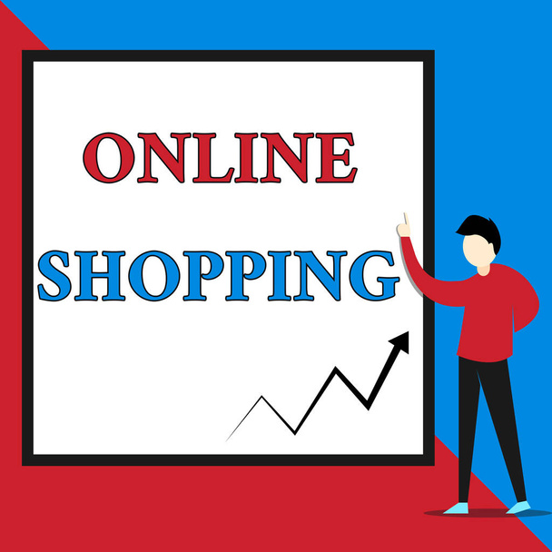 Textschild mit Online-Shopping. konzeptionelle Foto ermöglicht es Verbrauchern, ihre Waren über das Internet zu kaufen sehen junger Mann steht und zeigt auf leere Rechteck geometrischen Hintergrund. - Foto, Bild