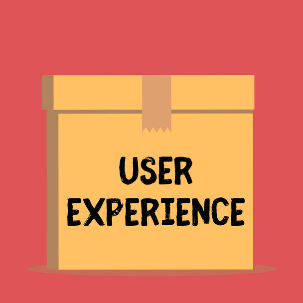 Käsiala teksti User Experience. Käsite tarkoittaa verkkosivuston käyttöä erityisesti sen suhteen, kuinka miellyttävää on käyttää Sulje edessä näkymä avoin ruskea kartonki suljettu laatikko kansi. Tyhjä tausta
. - Valokuva, kuva