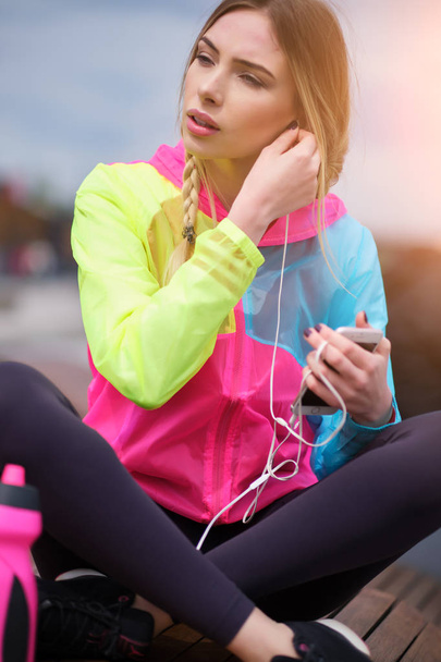 Sport woman with drinking water bottle is tired after running ex - Foto, Imagem