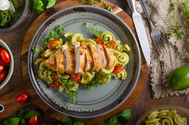 Homemade pesto pasta with grilled chicken - Photo, image