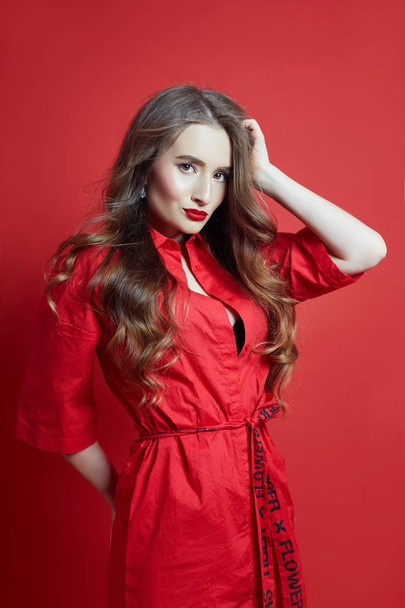 Fashion portrait of woman in red dress, beautiful makeup, curly  - Fotografie, Obrázek
