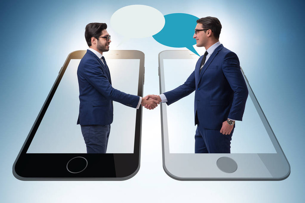 握手をするビジネスマンとのコミュニケーションの概念 - 写真・画像