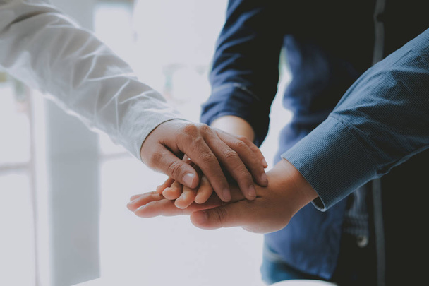businessman joining united hand, business team touching hands to - Photo, Image
