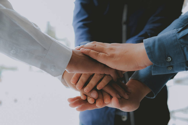 businessman joining united hand, business team touching hands to - Photo, Image