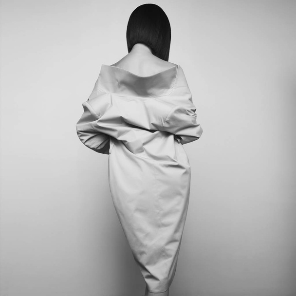 Beautiful sexy woman in white autumn coat. Fashion art portrait. - Foto, Imagem