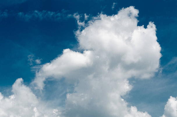 Incredibly wonderful lush cumulus clouds against a blue sky - Fotografie, Obrázek