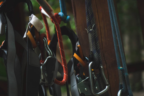 carabiner and rope from the safety systems in the adventure Park. - 写真・画像