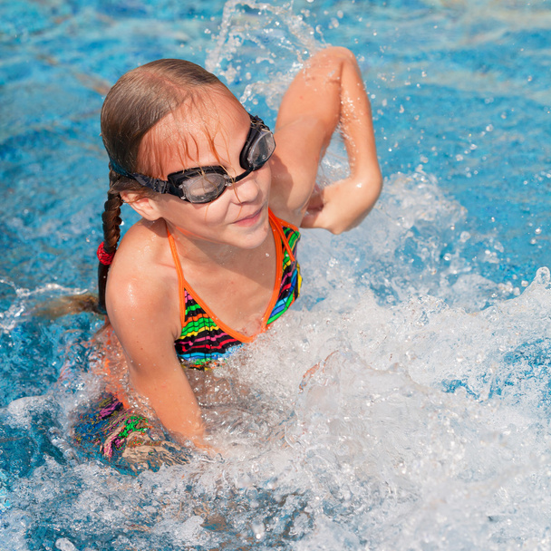 little girl in the swimming pool - Photo, Image
