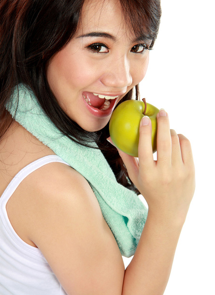 beauty fitness woman eating fresh green apple - Foto, Bild