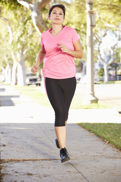 Female Runner Exercising On Suburban Street - Zdjęcie, obraz