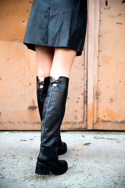 woman wearing black boots, close up - Photo, Image