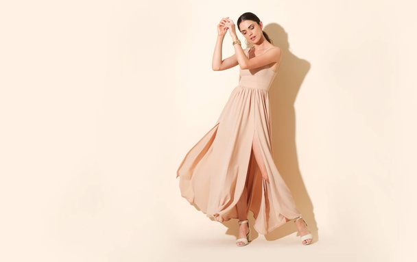 Beautiful shoot of model in long elegant dress. - Foto, Imagem