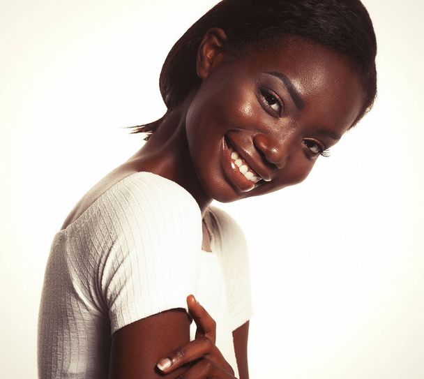 lifestyle and people concept:  Portrait of a beautiful young African woman smiling. - Valokuva, kuva