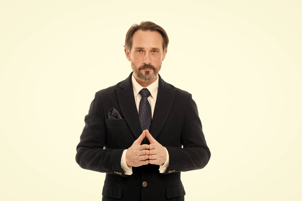 Back to work in a suit and tie. Mature businessman in formal wear. Senior man with grey beard hair. Bearded mature man in business style. Fashionable aged business person. Elegant gentleman - 写真・画像