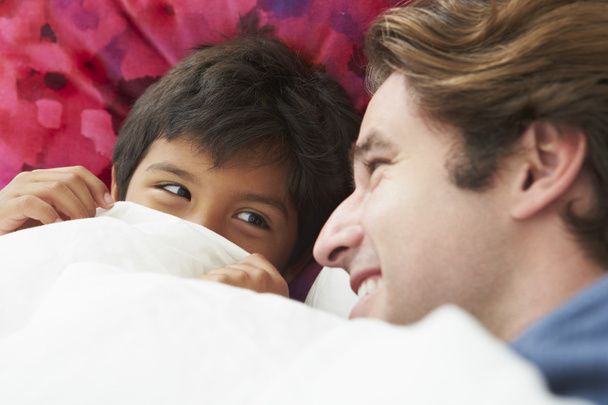 Father And Son Lying In Bed Together - Photo, image