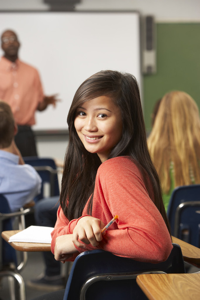 Female Teenage Pupil In Classroom - Fotó, kép