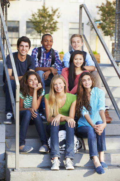 Group Of Teenage Pupils Outside Classroom - Фото, изображение