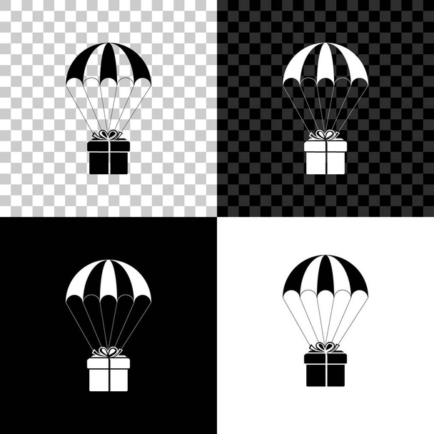 Coffret cadeau volant sur icône de parachute isolé sur fond noir, blanc et transparent. Service de livraison, concept de transport aérien, concept bonus. Illustration vectorielle
 - Vecteur, image