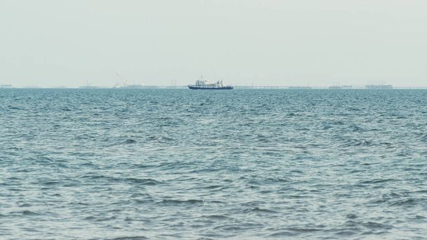 Small ship on the high seas - Фото, изображение