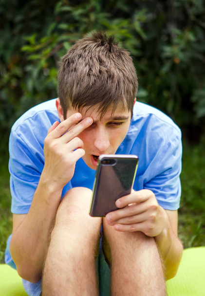 Young Man with a Phone - Zdjęcie, obraz